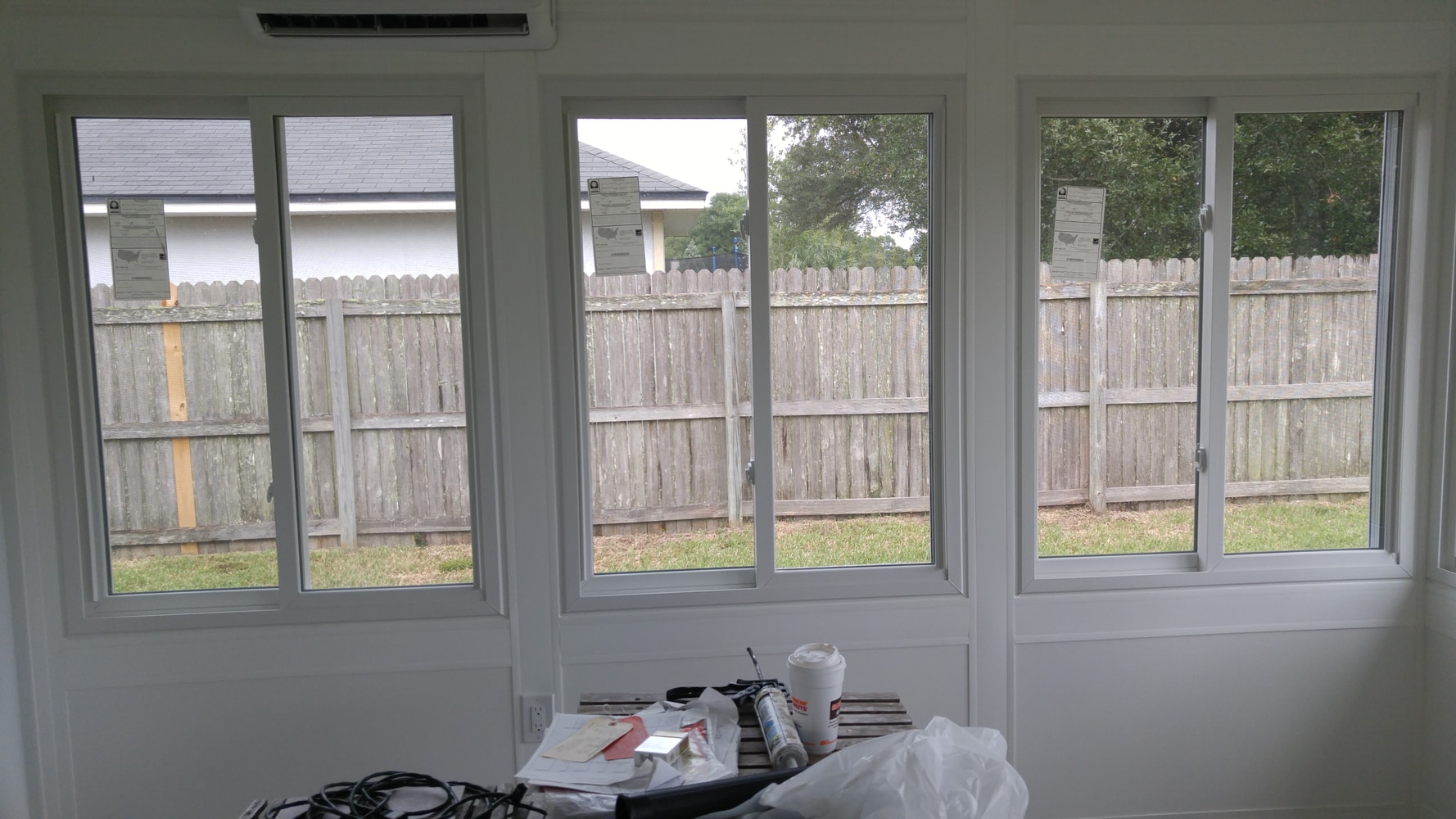 Nobles LivingSpace studio sunroom and paver patio