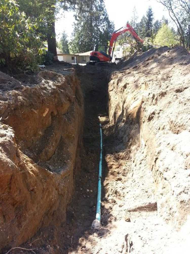 Photos from American Septic and Side Sewer LLC.