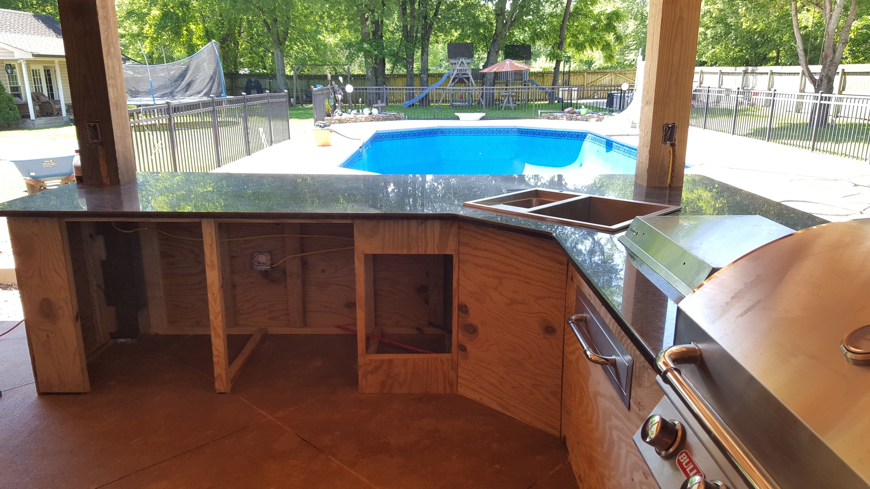 Covered Patio with Outdoor Kitchen and Fireplace (48' by 20')