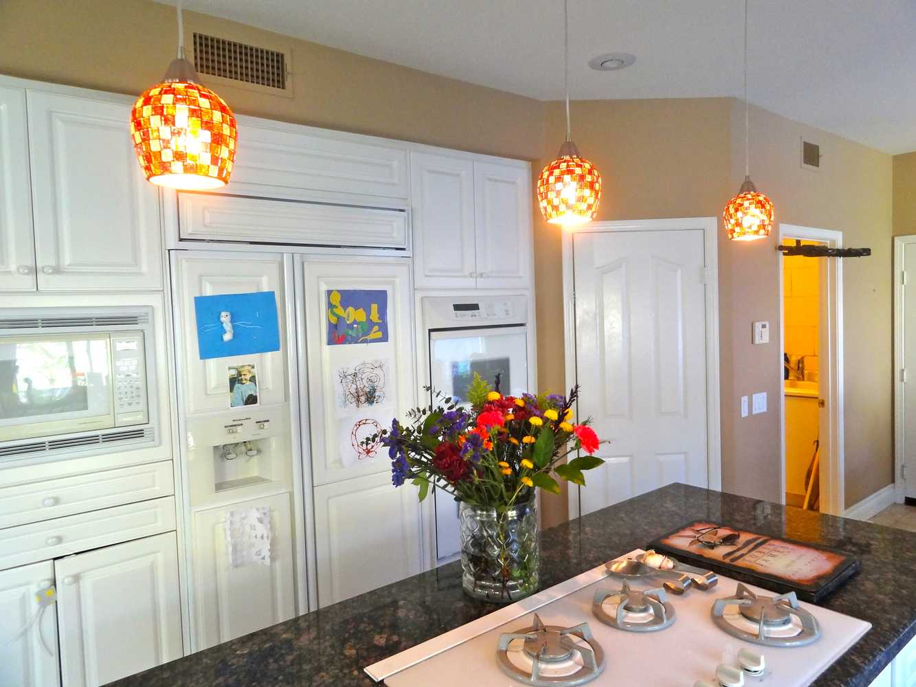 Carlsbad, Ca, kitchen pendants over Islands, and Dining chandalier.