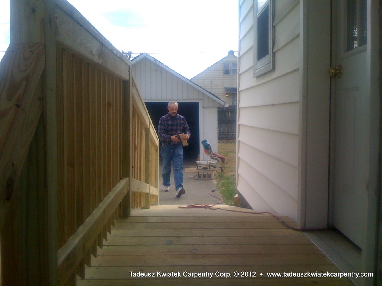 Small home remodel, Jasper, IN: deck and ramp, custom kitchen cabinets...