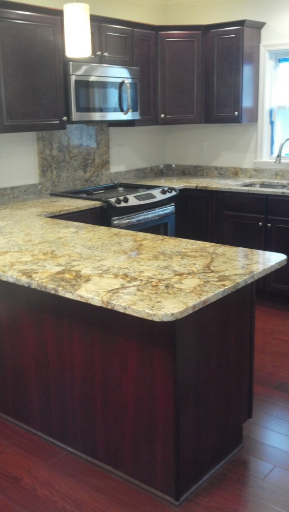 Project photos from Unlimited Kitchens and Bath Inc.