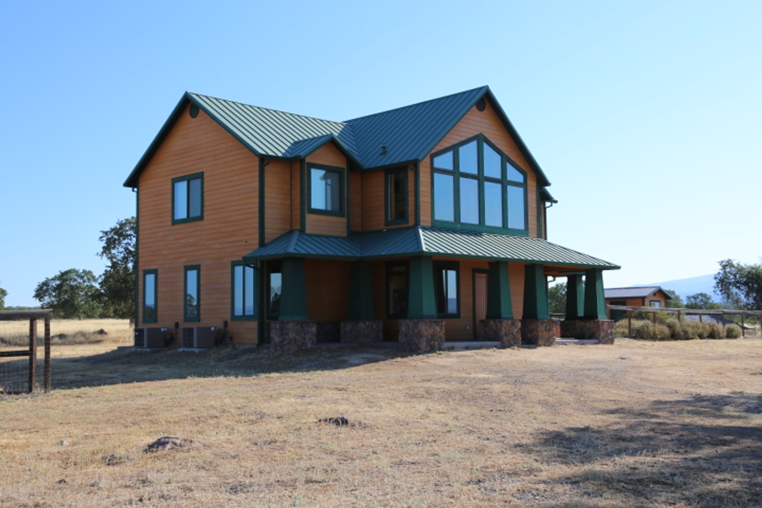 Rustic Home Construction by Built To Last Inc.