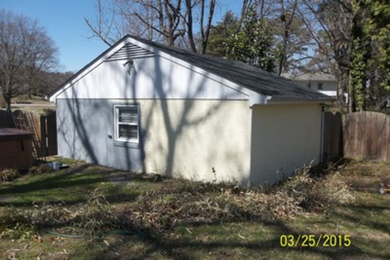 EXTERIOR PAINT BRICK (WHOLE HOUSE) AND DETACHED GARAGE