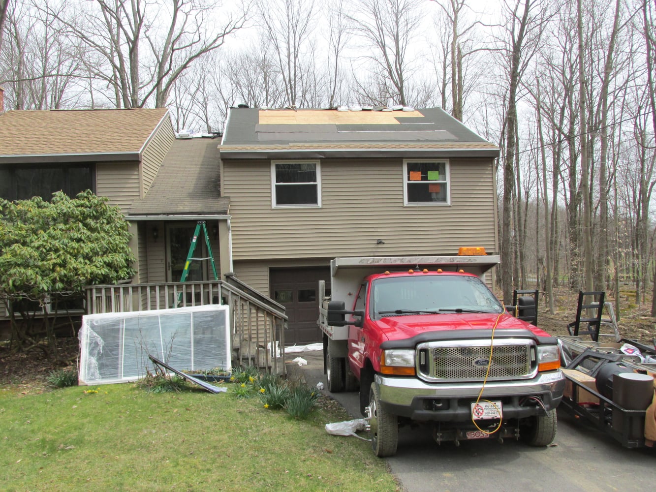 Window, Door, Fascia, Gutters, and a New Roof