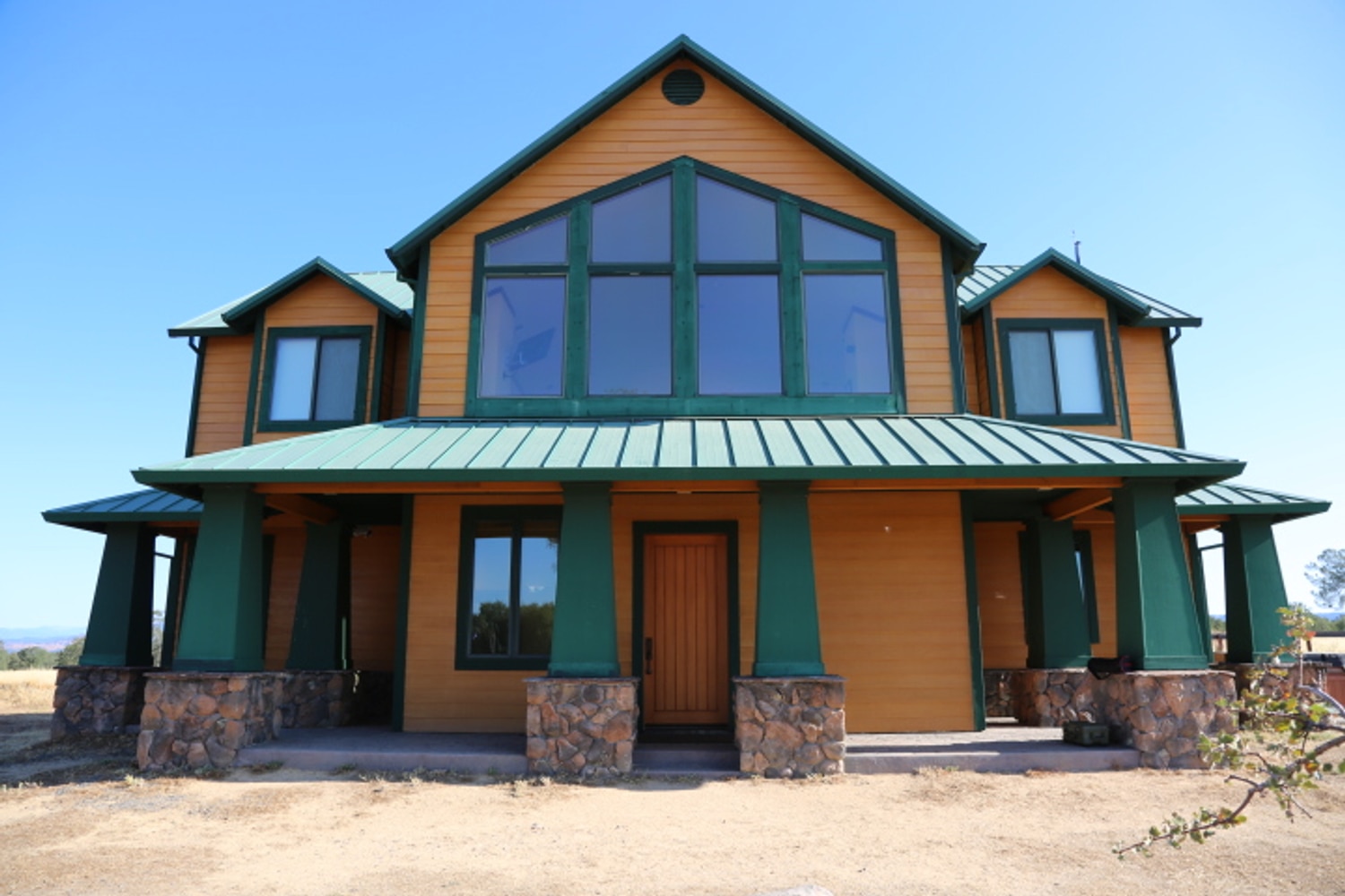 Rustic Home Construction by Built To Last Inc.