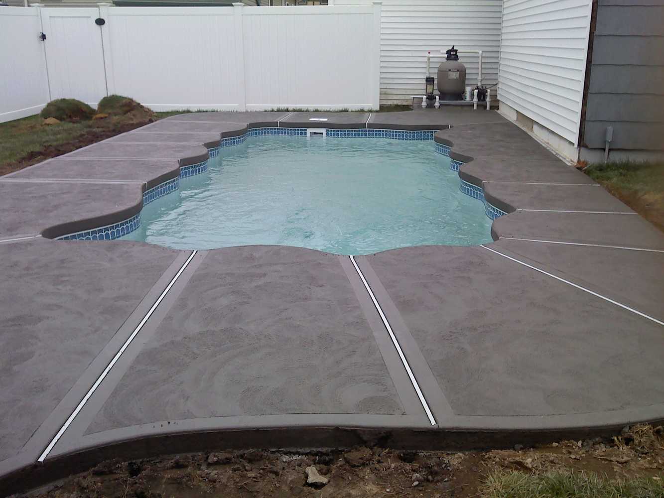 Installation of concrete Patios around of In-ground swimming Pools.