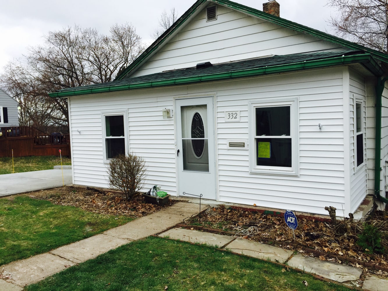 Front porch becomes a three season porch 