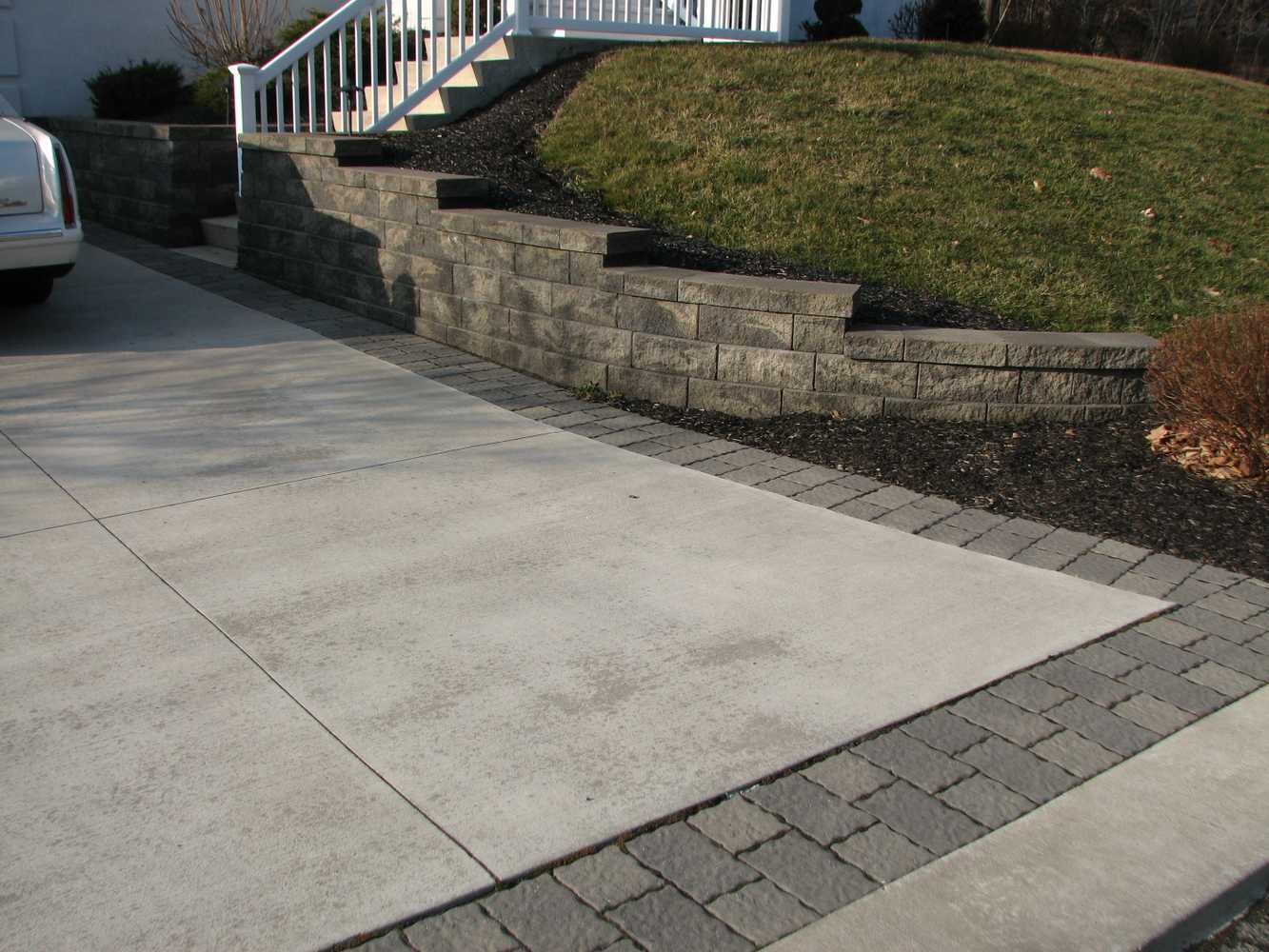 Retaining walls, accented driveways, and raised porches