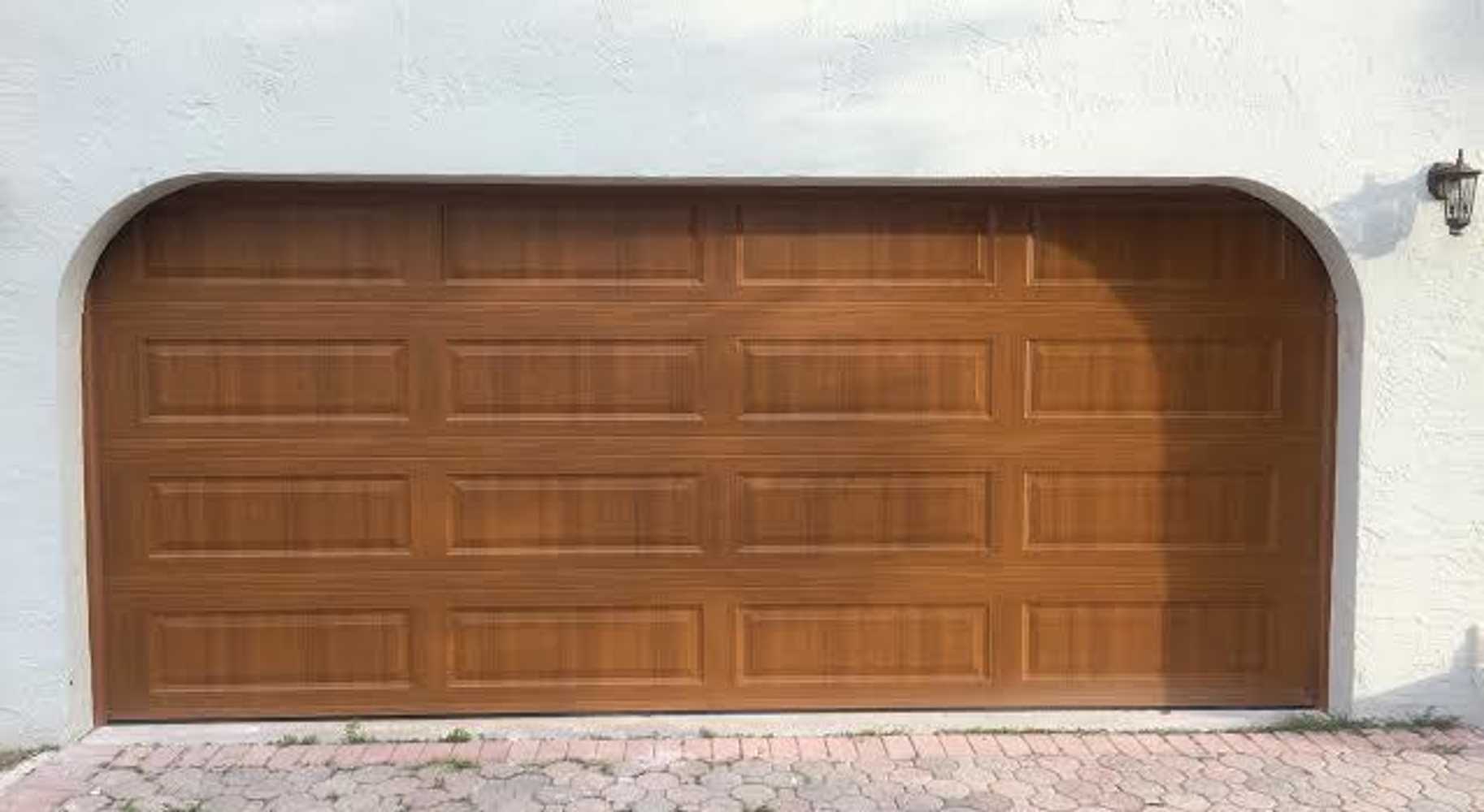 View our work: Garage Door Solutions Corp