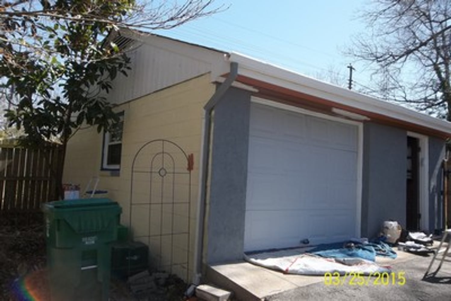 EXTERIOR PAINT BRICK (WHOLE HOUSE) AND DETACHED GARAGE