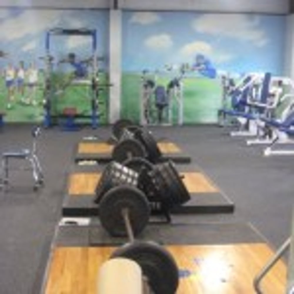 Rocket Club Weight Room by C.H.I. Construction Inc.
