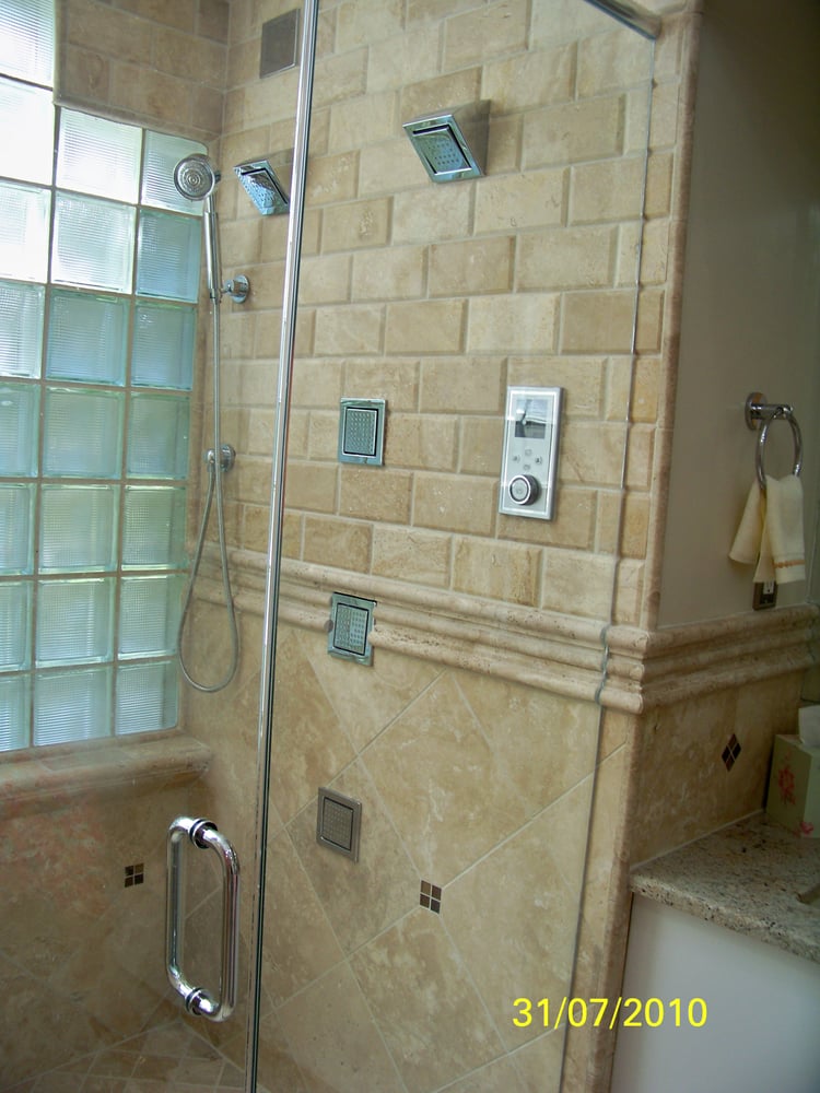 Tile, Santos Mahogany Install w/ Medallion/ Custom Home Build/