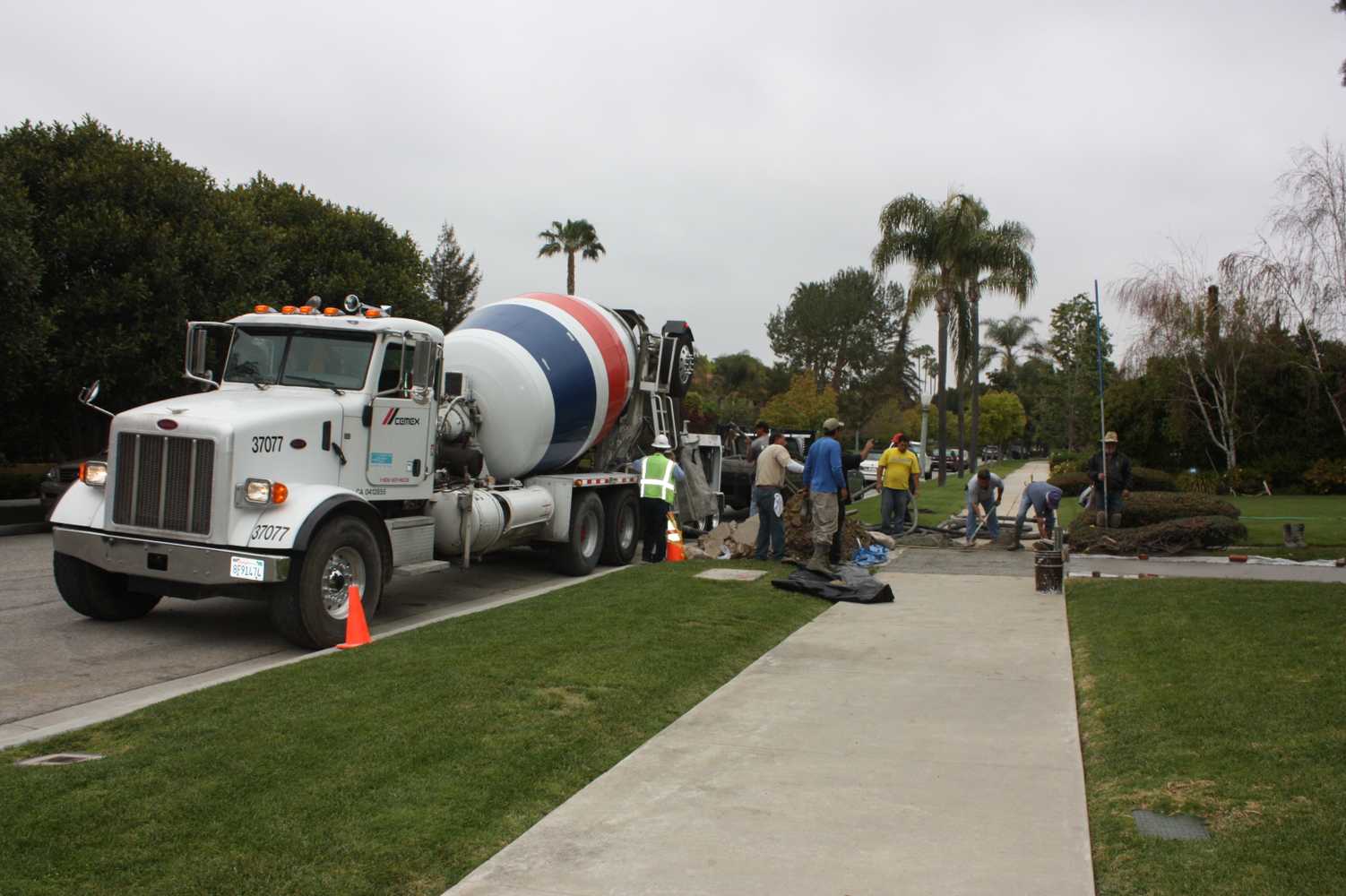 Repairing Sidewalks In Fremont Place.