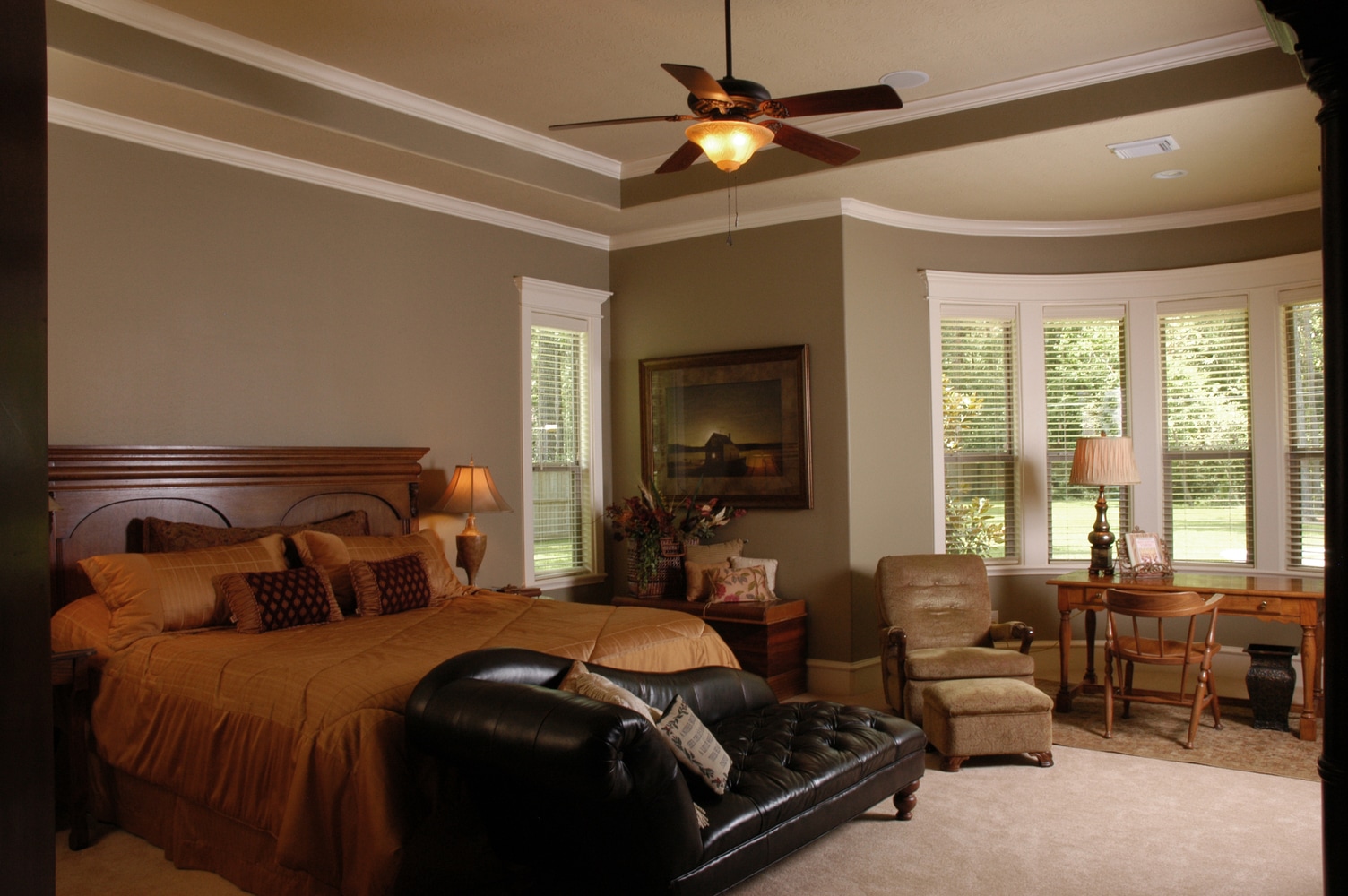 In the Lap of Luxury Master Bedroom Suites by Frontier Custom Builders, Inc.