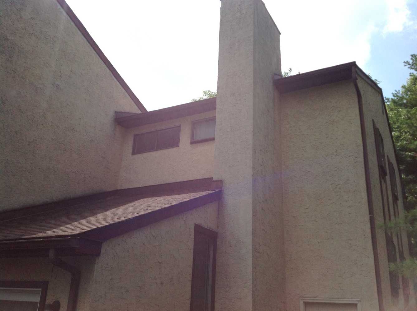 Exterior Stucco Power wash and repaint Photos