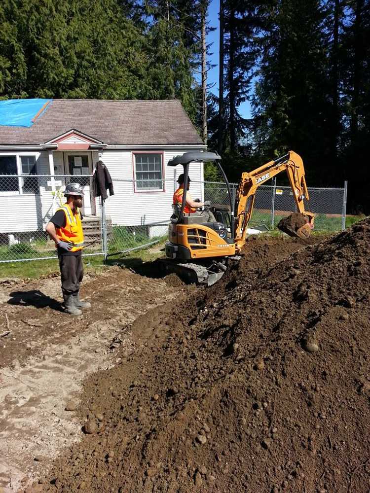 Photos from American Septic and Side Sewer LLC.