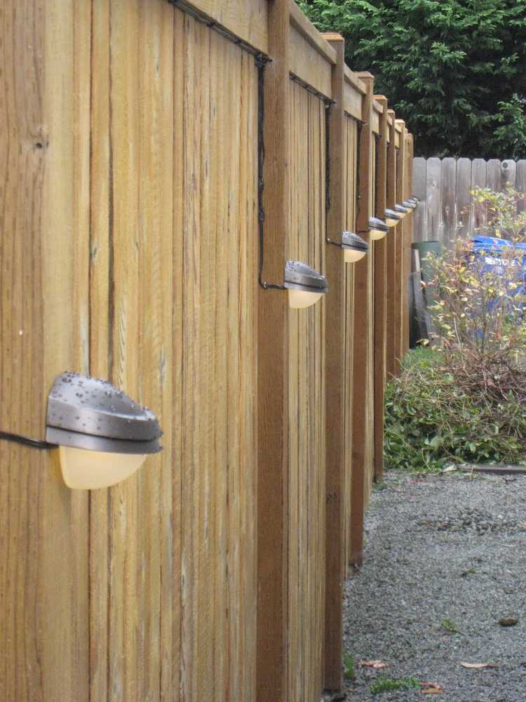 Walkway lighting and fence stain