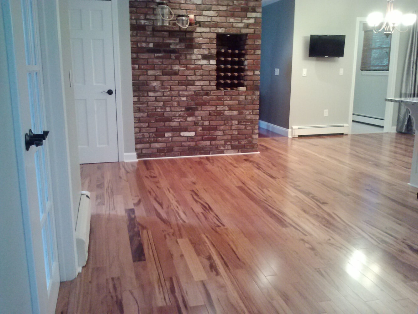 Installed Pre-Finished Hardwood Flooring (Bellawood Brazilian Koa) that our client purchased at Lumber Liquidators