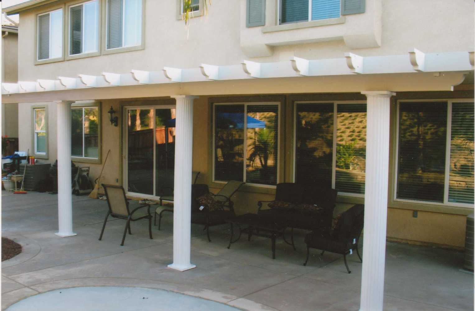 Solid & Lattice patio covers & rain gutters