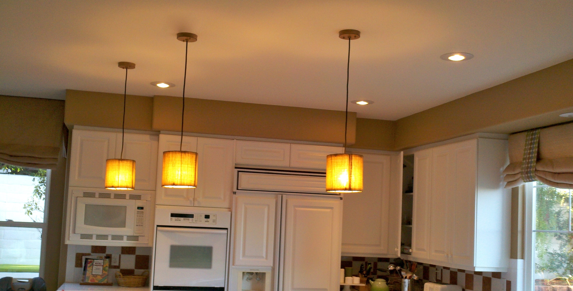 Carlsbad, California. pendants over Island and Chandalier over dining table.