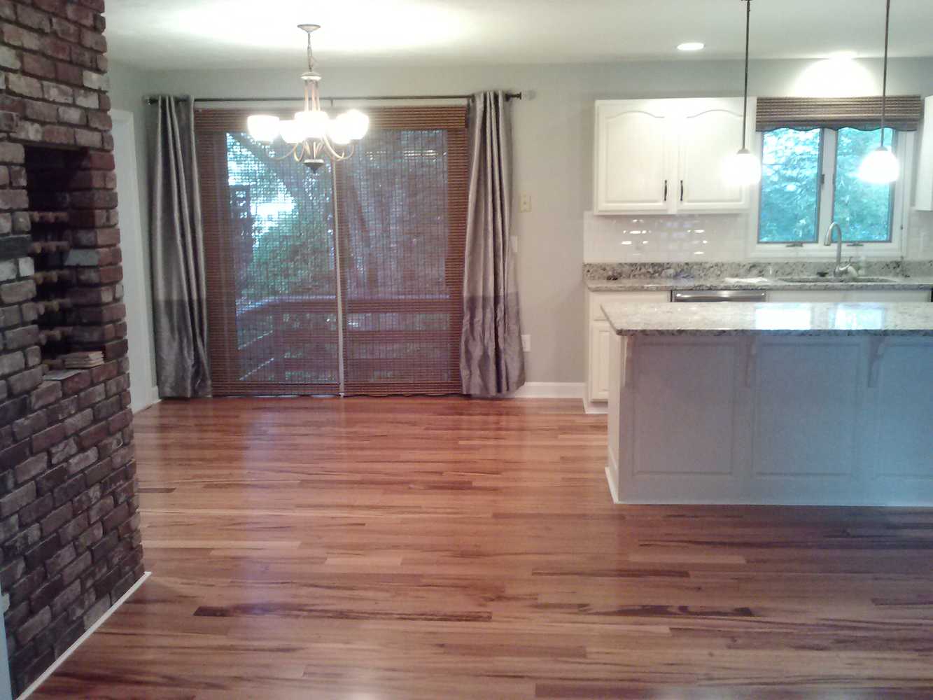 Installed Pre-Finished Hardwood Flooring (Bellawood Brazilian Koa) that our client purchased at Lumber Liquidators