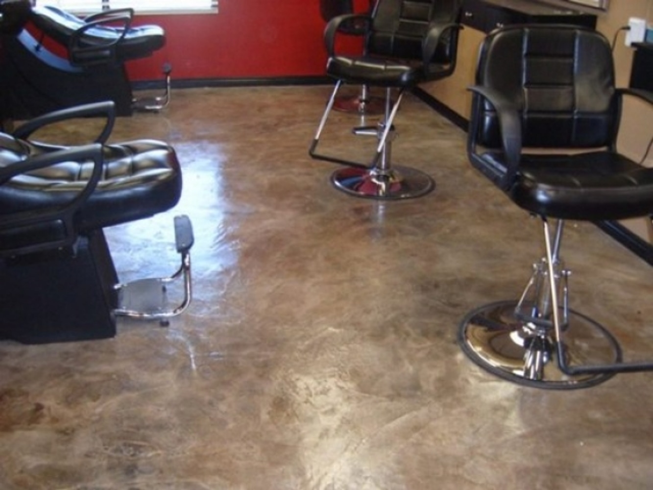 Icoat concrete interior flooring overlay system.