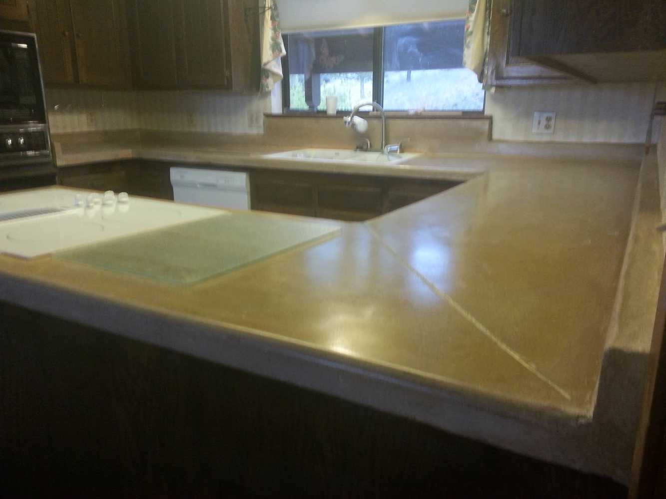Custom poured in place monolithically poured backsplash and countertop
