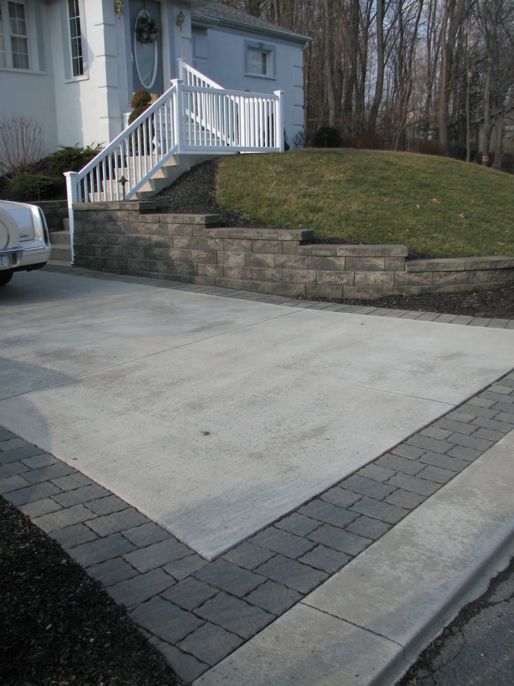 Retaining walls, accented driveways, and raised porches