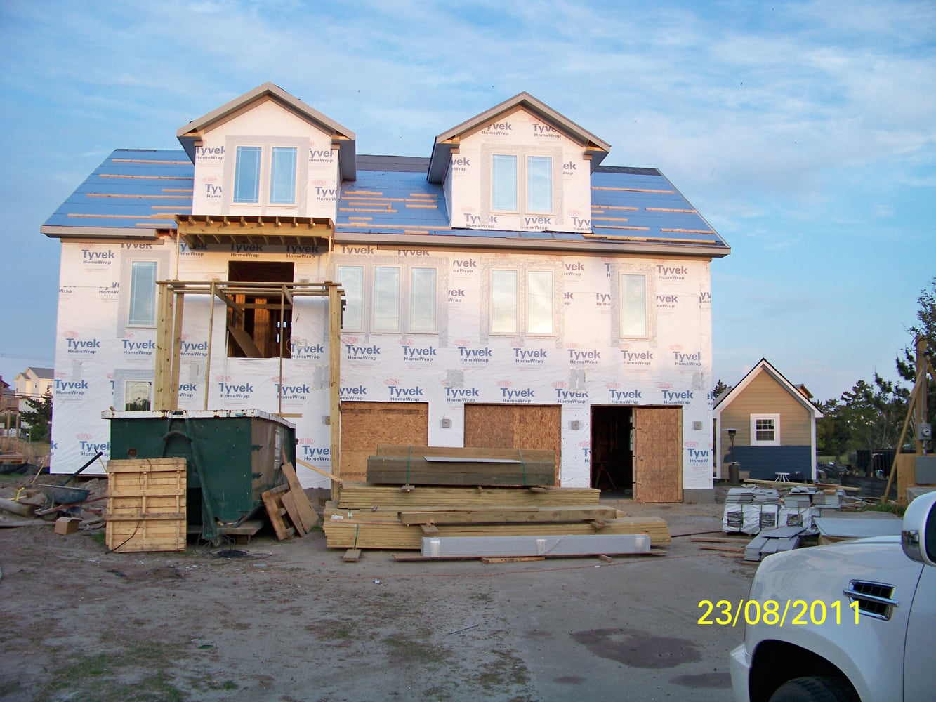 Tile, Santos Mahogany Install w/ Medallion/ Custom Home Build/