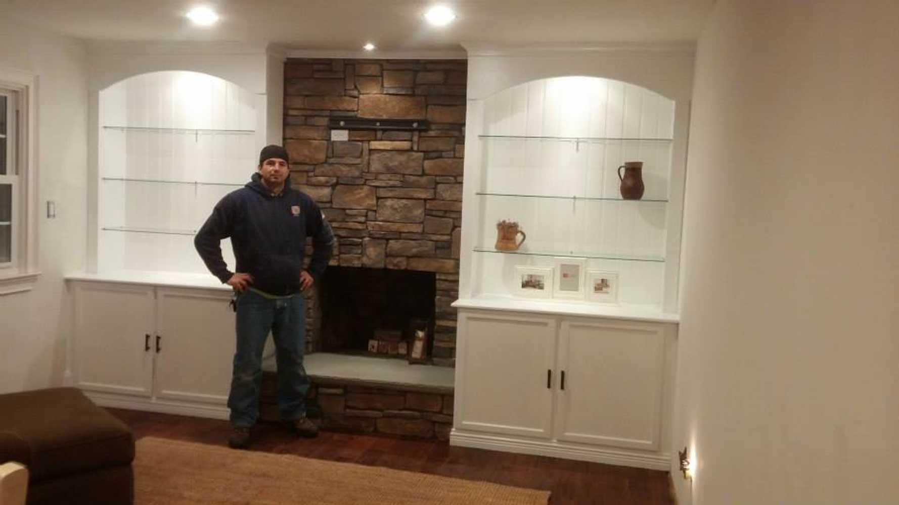 bookshelves and stone work on old fireplace