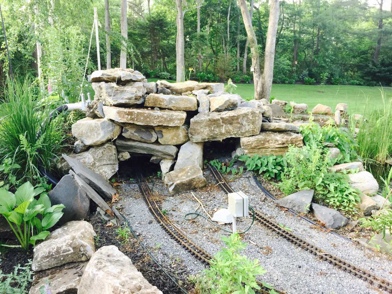 Outdoor Waterfall With Trains