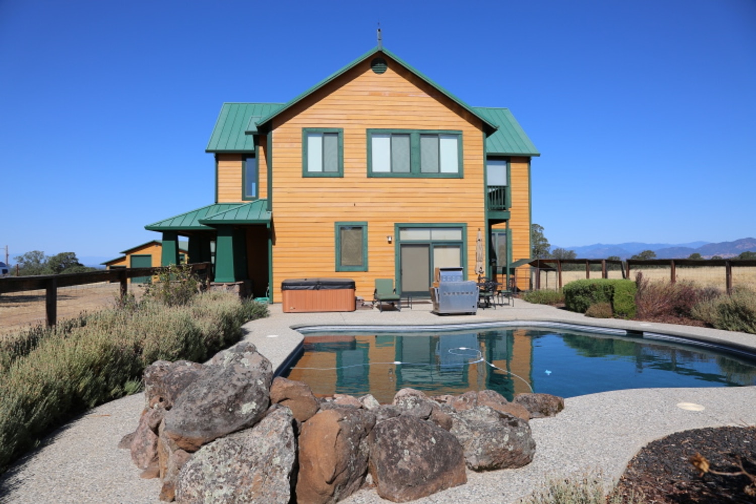 Rustic Home Construction by Built To Last Inc.