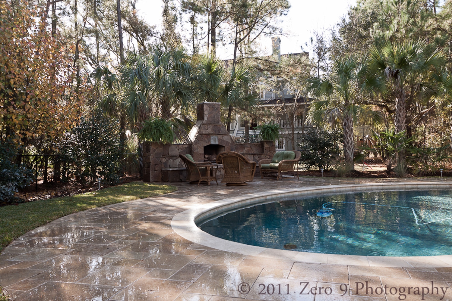 Travertine Pool Deck with custom design Oudoor Fireplace