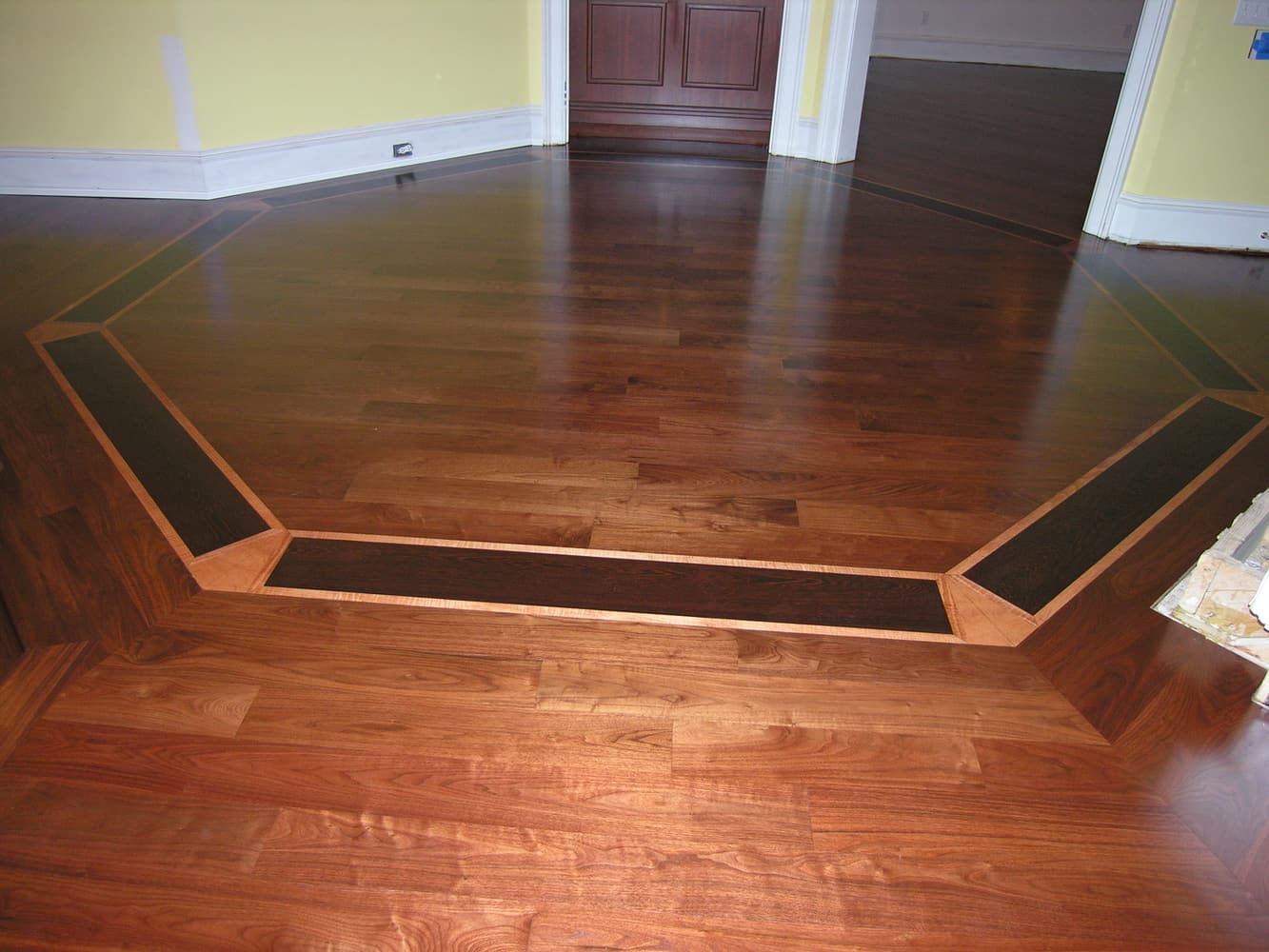 Tile, Santos Mahogany Install w/ Medallion/ Custom Home Build/