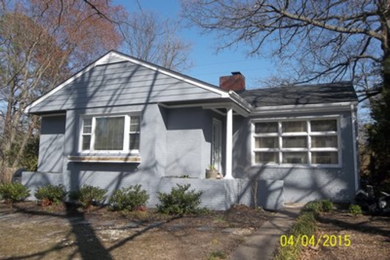 EXTERIOR PAINT BRICK (WHOLE HOUSE) AND DETACHED GARAGE