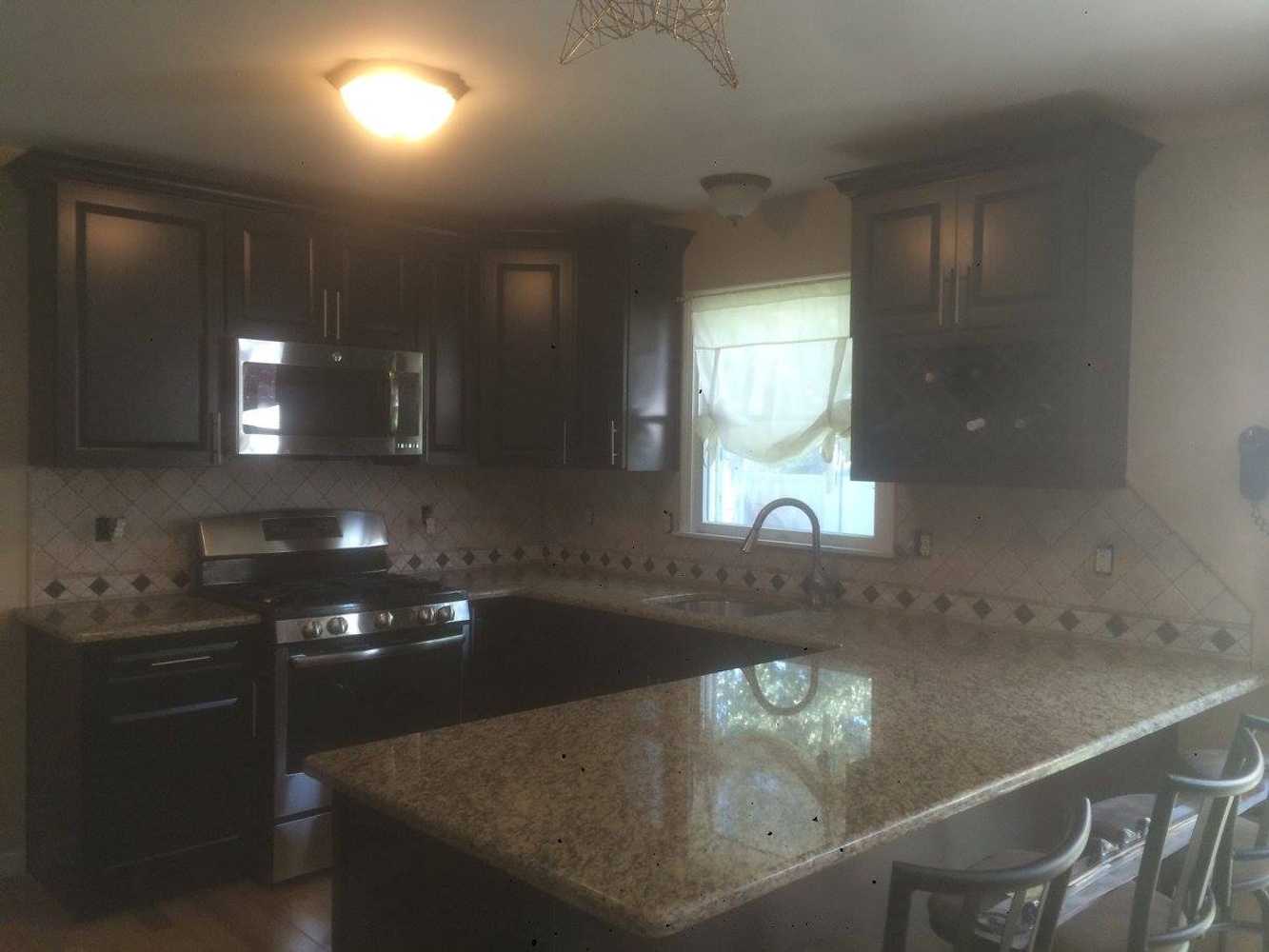 Kitchen and Flooring remodel from water damage