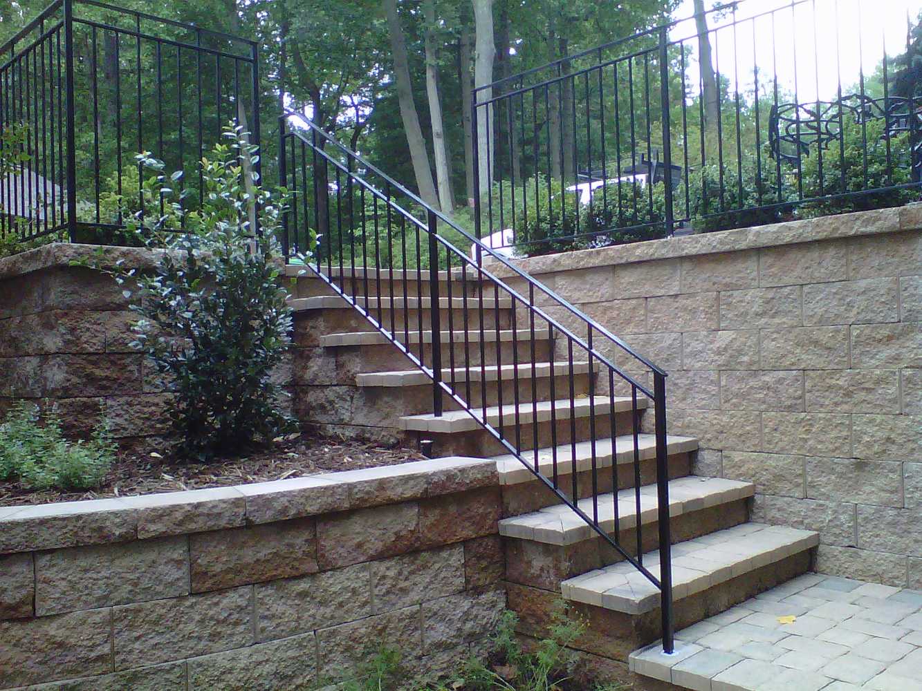 Ornamental Rails on Custom Steps and Wall