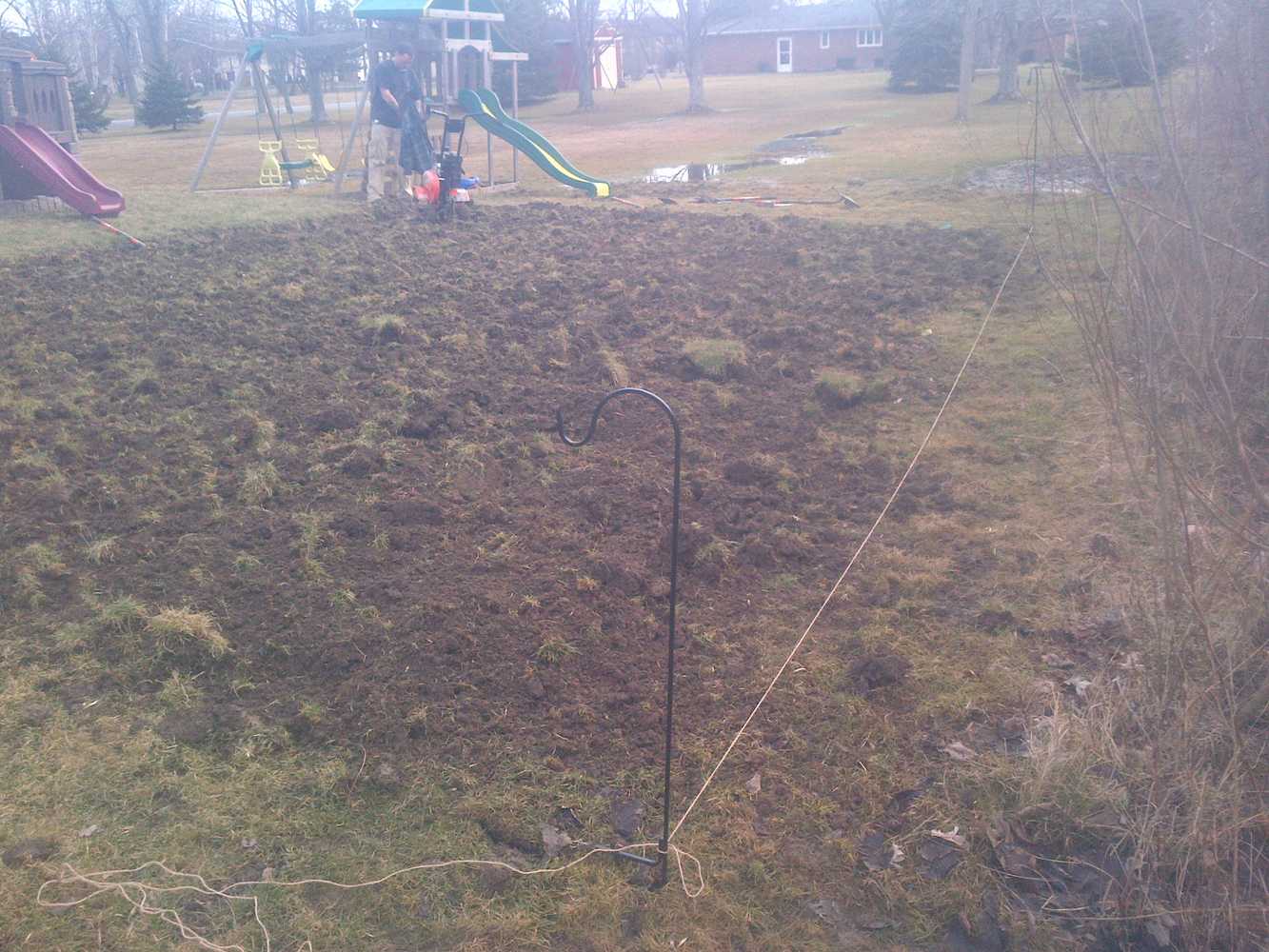 Playground installation ( Leveling & Grading & Building support for play area)