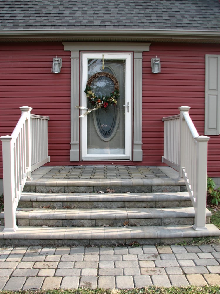 Retaining walls, accented driveways, and raised porches