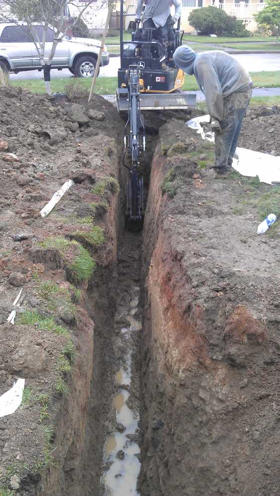 Photos from American Septic and Side Sewer LLC.