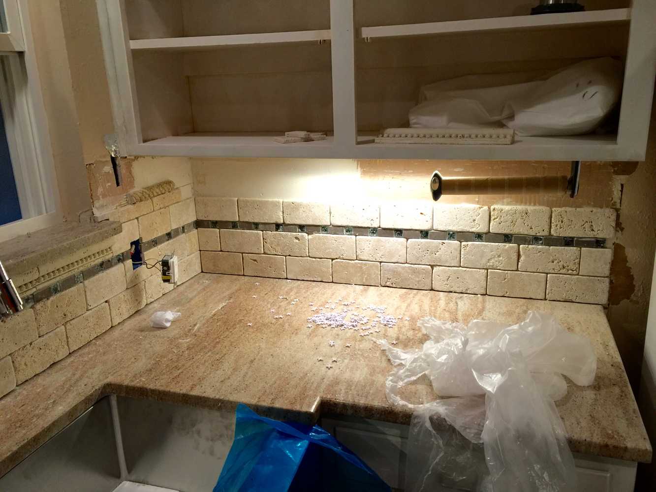 Hidden safe, complete kitchen remodel custom mosaic backsplash and cabinets