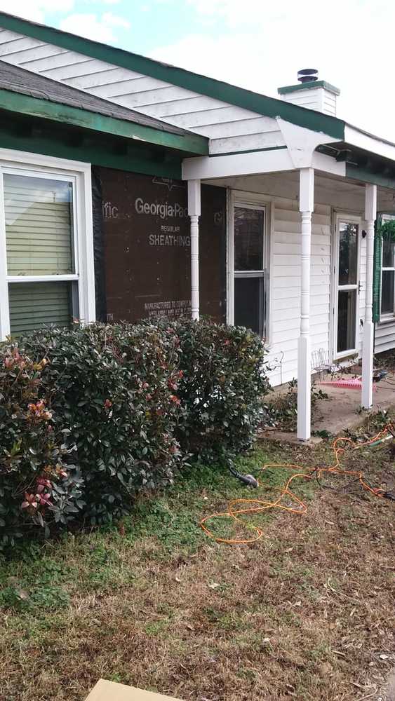 John's vinyl siding and shutter replacement job. Front porch posts replacement and rotted wood replacement and Repairs.