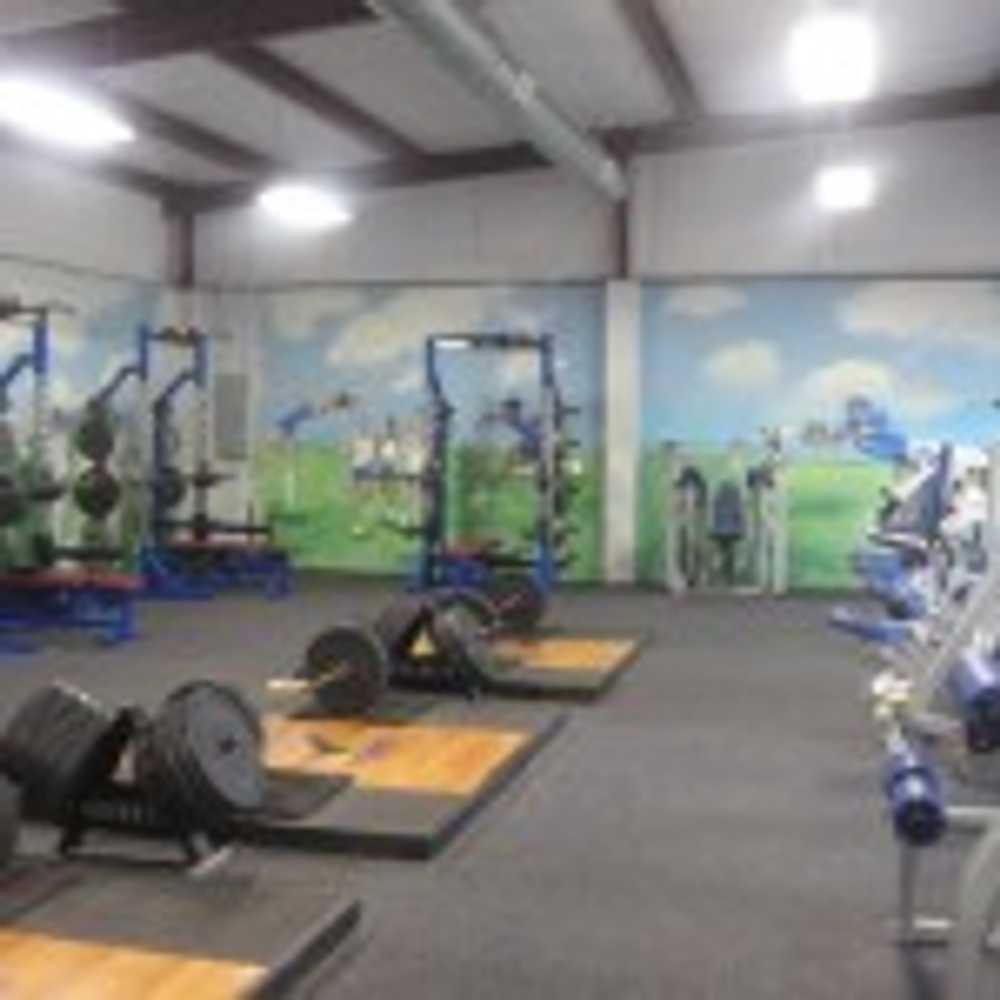 Rocket Club Weight Room by C.H.I. Construction Inc.