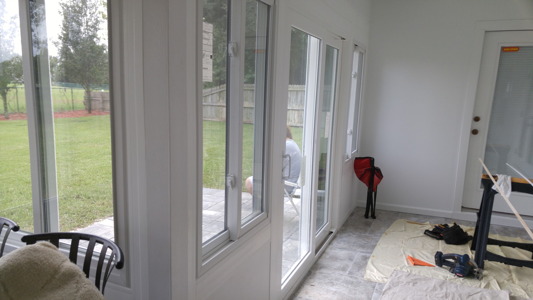 Nobles LivingSpace studio sunroom and paver patio