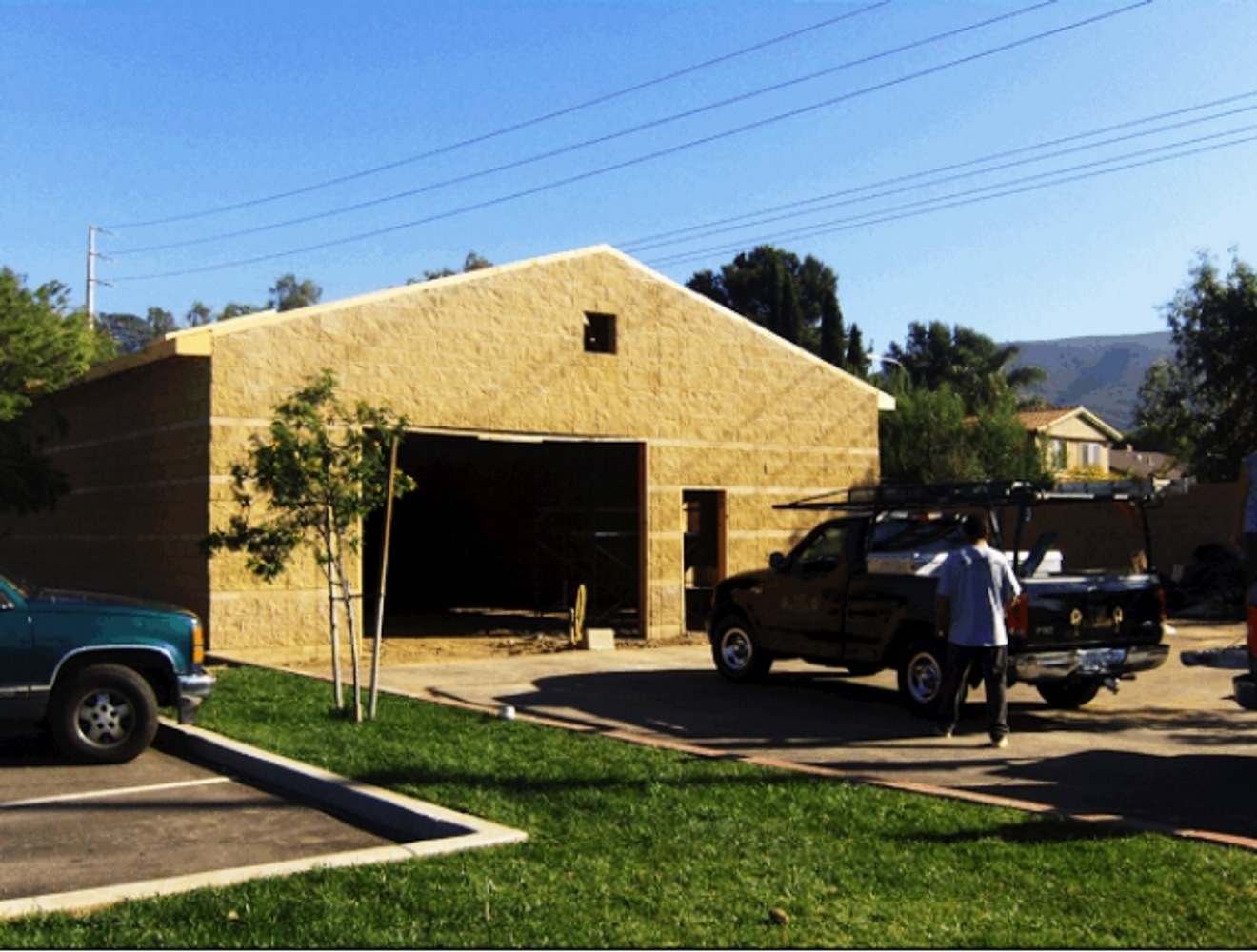 Masonry building with wood frame roof