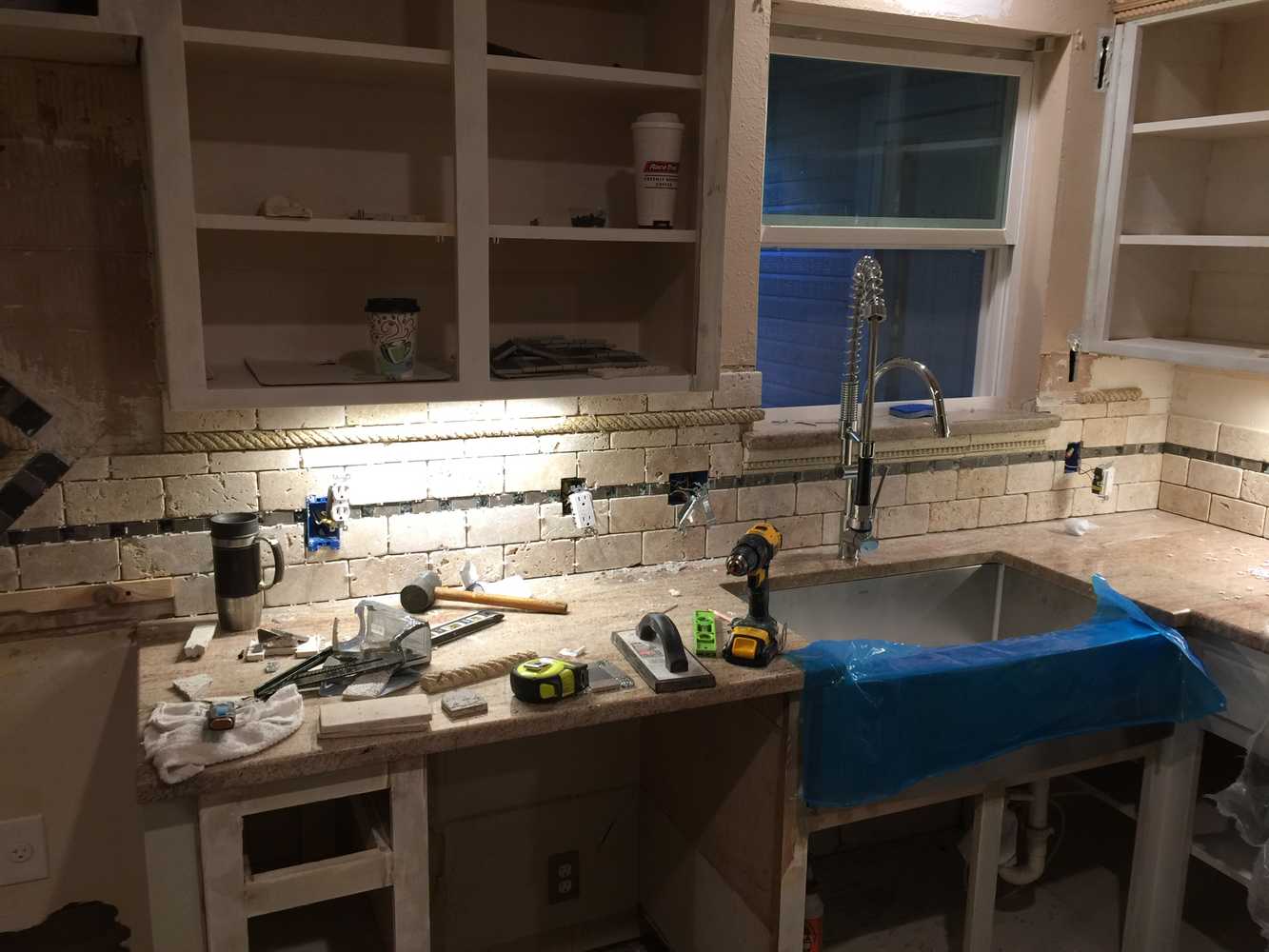 Hidden safe, complete kitchen remodel custom mosaic backsplash and cabinets