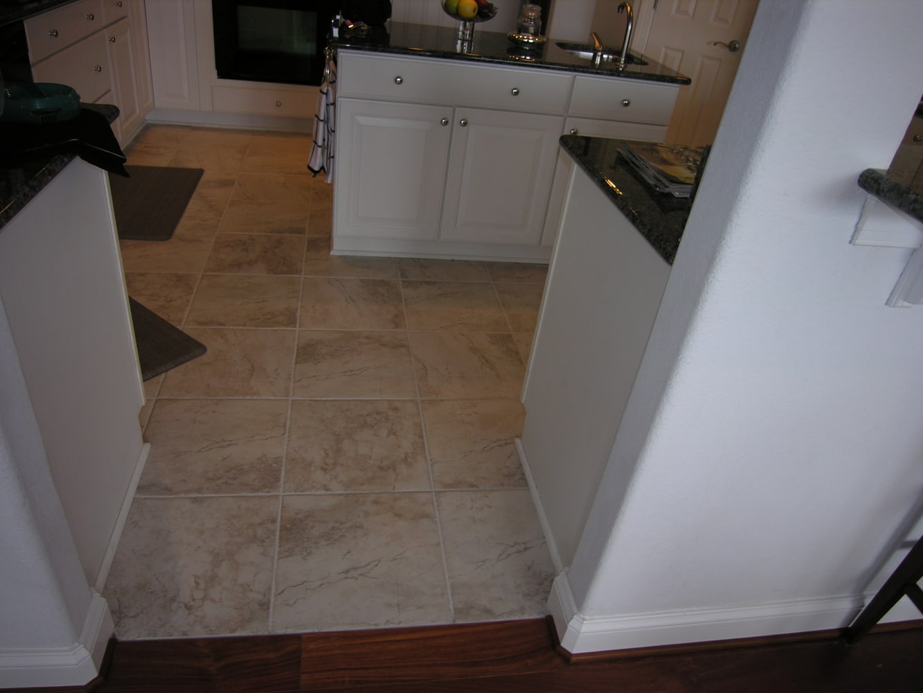 Tile, Santos Mahogany Install w/ Medallion/ Custom Home Build/