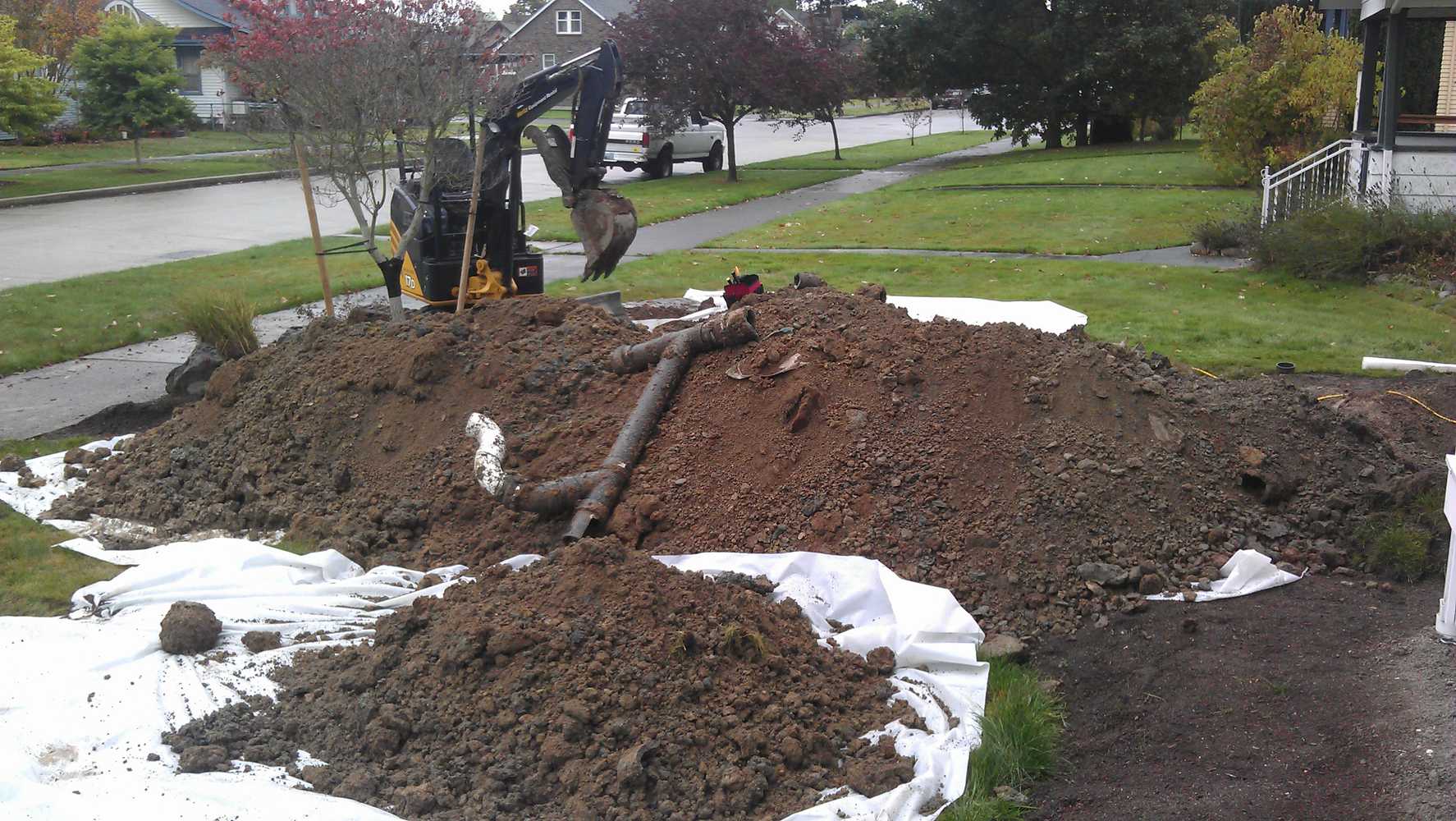 Photos from American Septic and Side Sewer LLC.