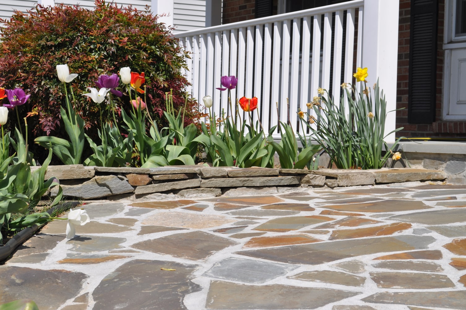 Stacked stone garden wall 